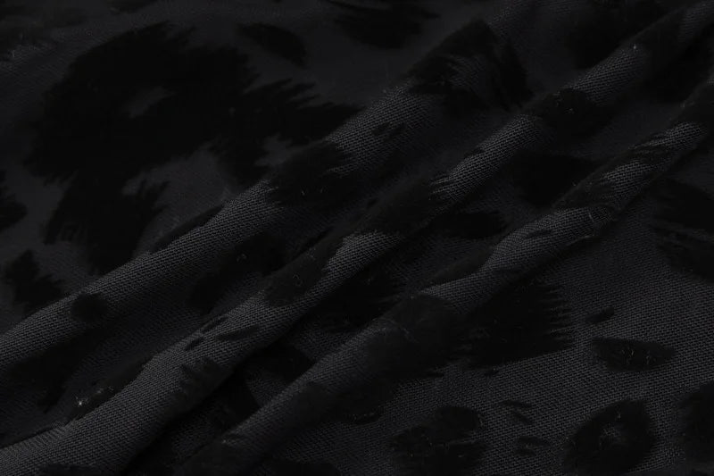 OMSJ 2024 mono ajustado asimétrico sexi de malla transparente con estampado de leopardo para invierno nuevo mono calado de manga larga ajustado entrecruzado