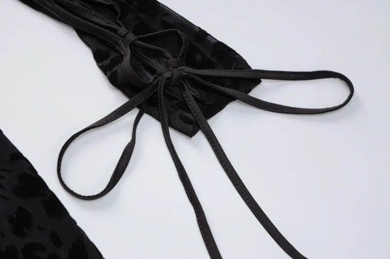 OMSJ 2024 mono ajustado asimétrico sexi de malla transparente con estampado de leopardo para invierno nuevo mono calado de manga larga ajustado entrecruzado