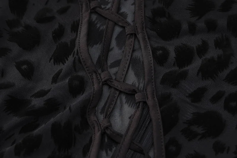 OMSJ 2024 mono ajustado asimétrico sexi de malla transparente con estampado de leopardo para invierno nuevo mono calado de manga larga ajustado entrecruzado