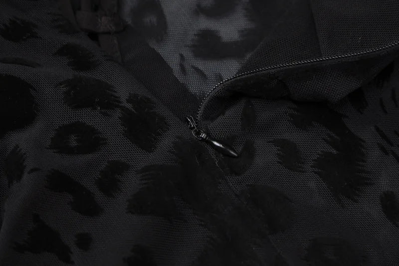 OMSJ 2024 mono ajustado asimétrico sexi de malla transparente con estampado de leopardo para invierno nuevo mono calado de manga larga ajustado entrecruzado