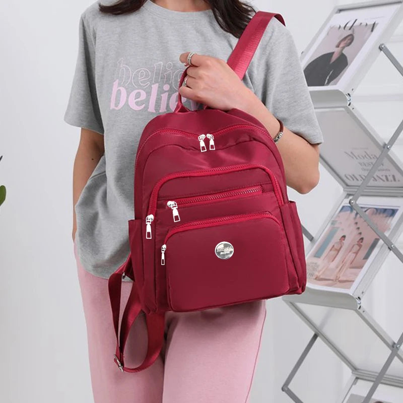 Bolso de doble hombro de nailon de estilo neutro para hombres y mujeres, adecuado para viajes de negocios, varios colores disponibles.