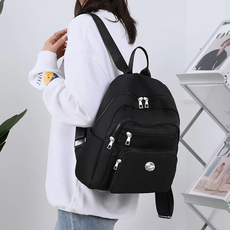Bolso de doble hombro de nailon de estilo neutro para hombres y mujeres, adecuado para viajes de negocios, varios colores disponibles.