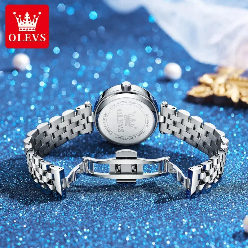 OLEVS 3641 Elegante reloj de cuarzo resistente al agua para mujer Esfera estrellada luminosa de acero inoxidable con caja de regalo - Accesorio de moda para mujer