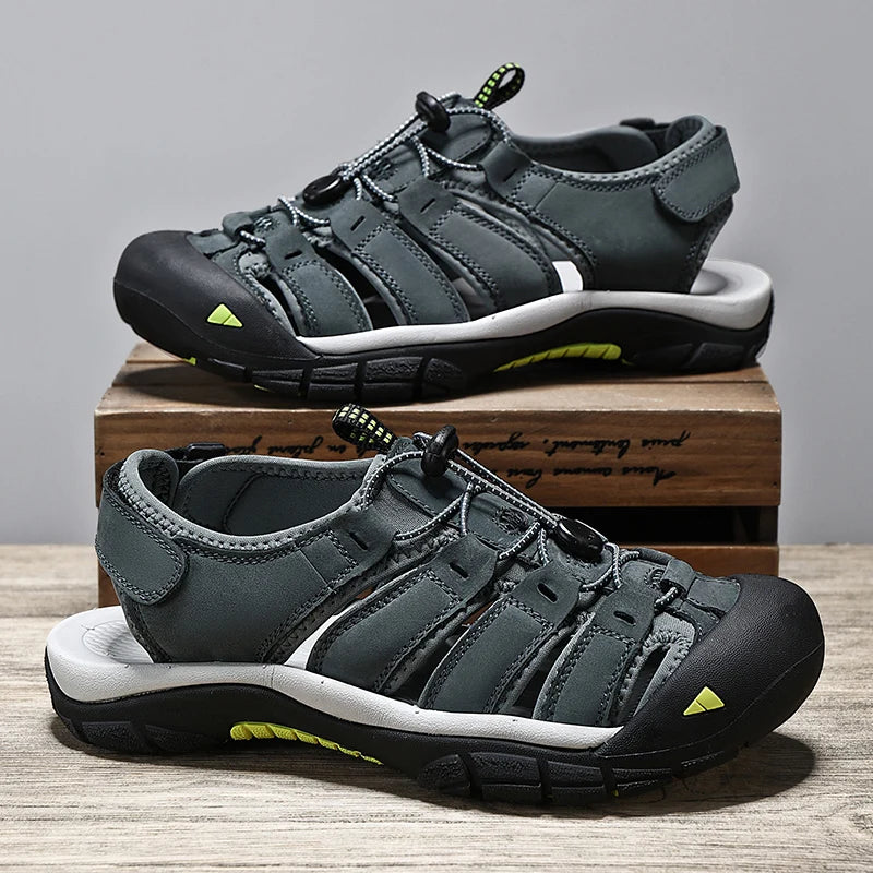 Sandalias de piel auténtica para hombre, zapatos informales transpirables de diseño a la moda, fondo suave, talla grande, para playa y exteriores, novedad de verano