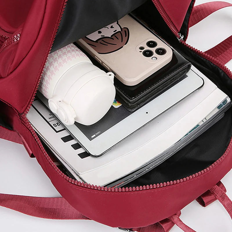 Bolso de doble hombro de nailon de estilo neutro para hombres y mujeres, adecuado para viajes de negocios, varios colores disponibles.