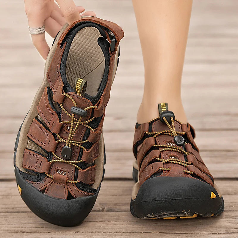 Sandalias de piel auténtica para hombre, zapatos informales transpirables de diseño a la moda, fondo suave, talla grande, para playa y exteriores, novedad de verano