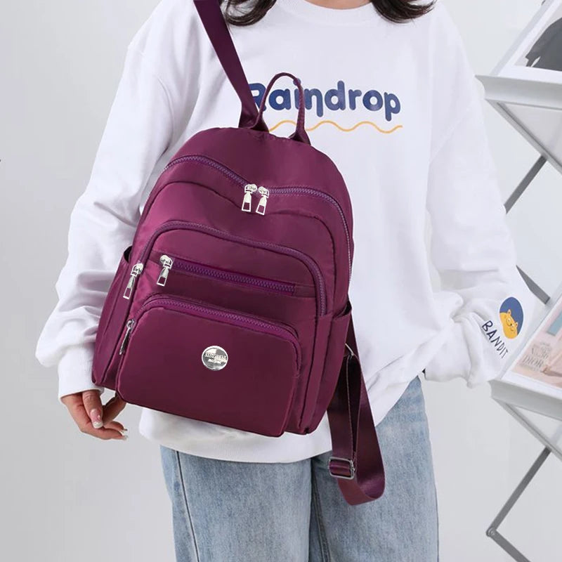 Bolso de doble hombro de nailon de estilo neutro para hombres y mujeres, adecuado para viajes de negocios, varios colores disponibles.