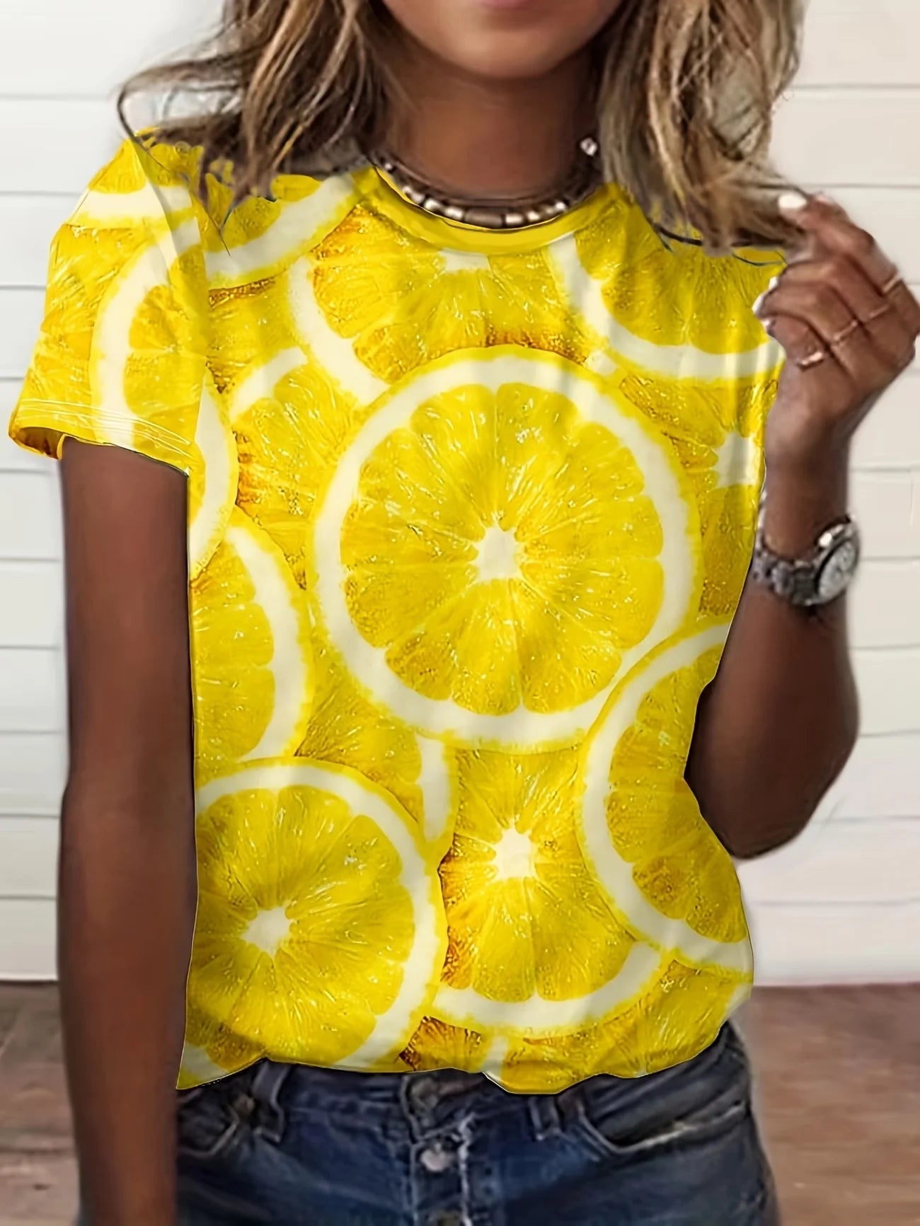 Maintain your effortlessly cute look in this soft daisy print tee. Light blue base with white daisies, round neck, short sleeve, breathable, c