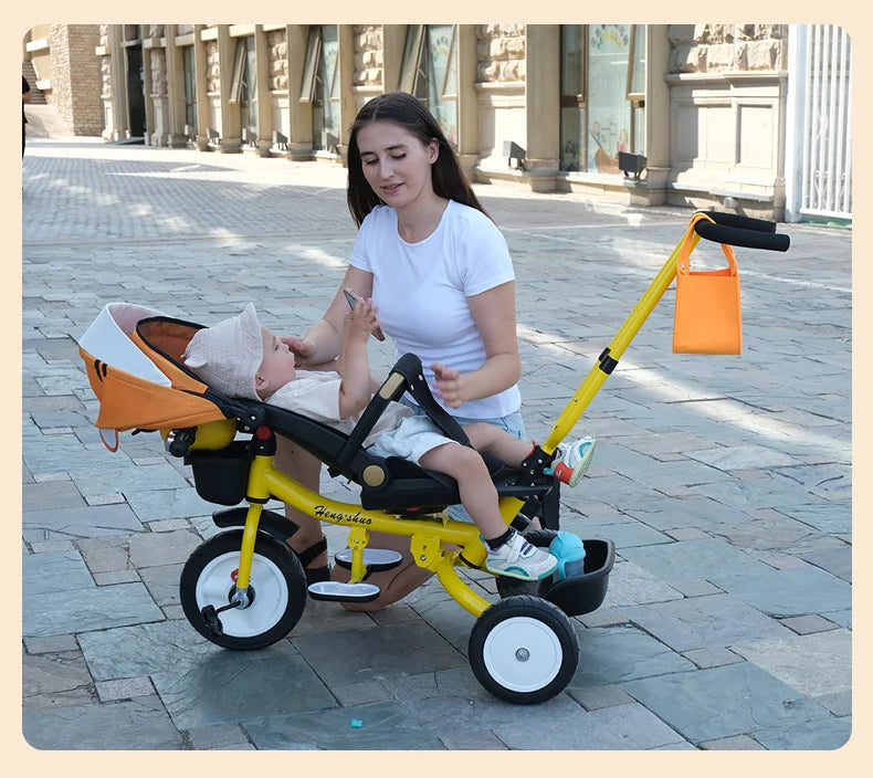 El triciclo se puede plegar, reclinar y sentarse, y la bicicleta se puede empujar a mano